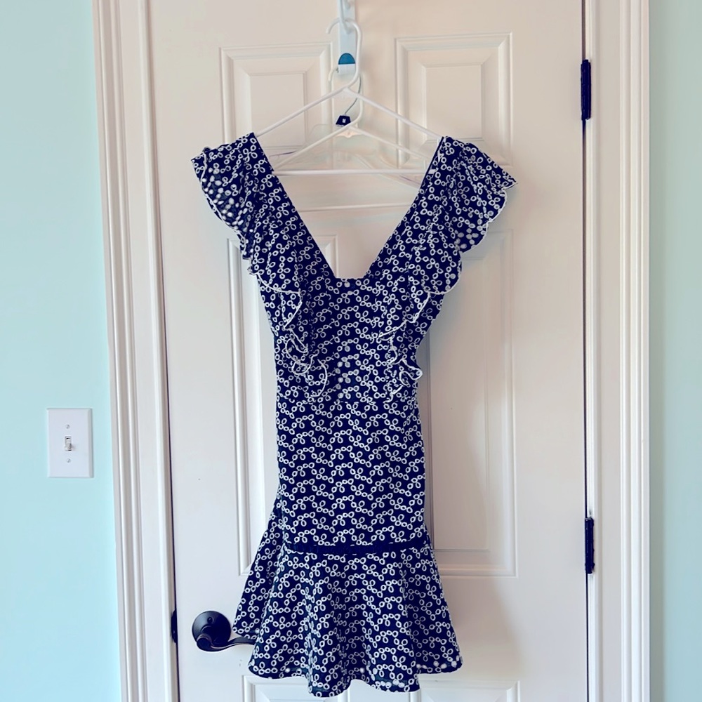 Beautiful navy eyelet summer dress with partially exposed back. Fully lined.